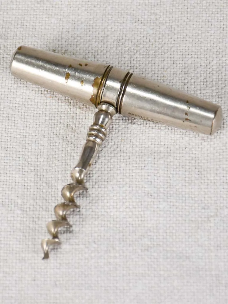 Early 20th century travel bottle opener