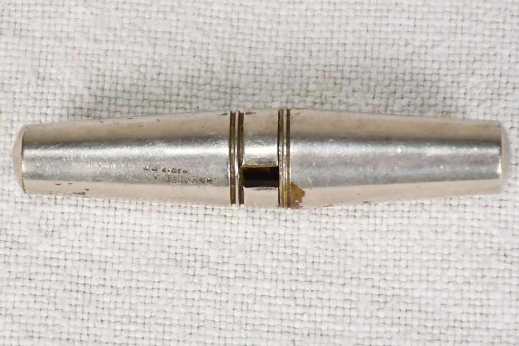 Early 20th century travel bottle opener