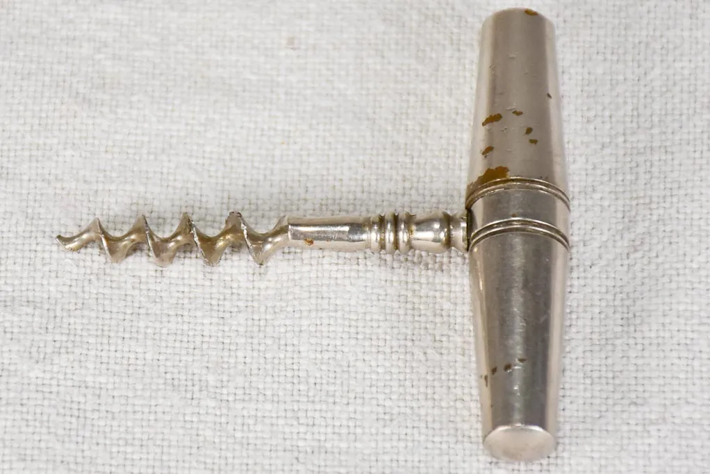 Early 20th century travel bottle opener